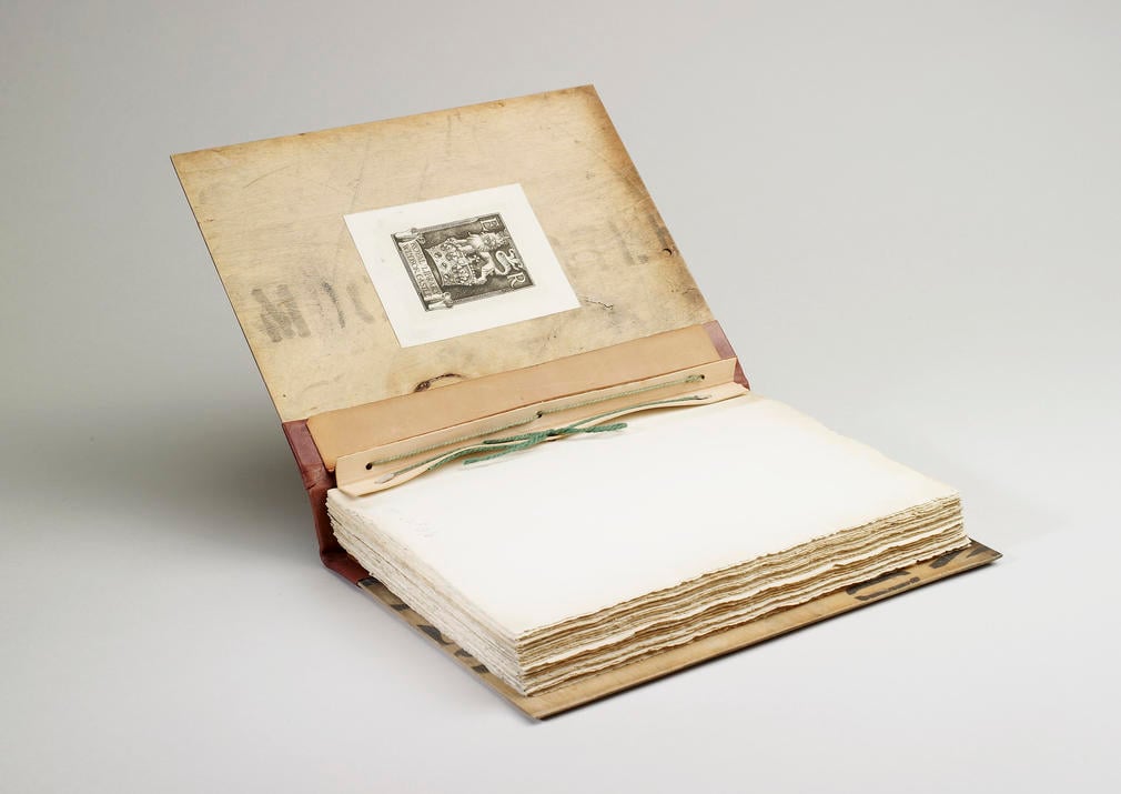 Bound in Venesta packing case boards, rebacked in quarter leather cow with original cowhide spine inset

Aurora Australis was the first book ever to be printed in the Antarctic, on a press donated by Joseph Causton and Sons. It contained a mixture of se