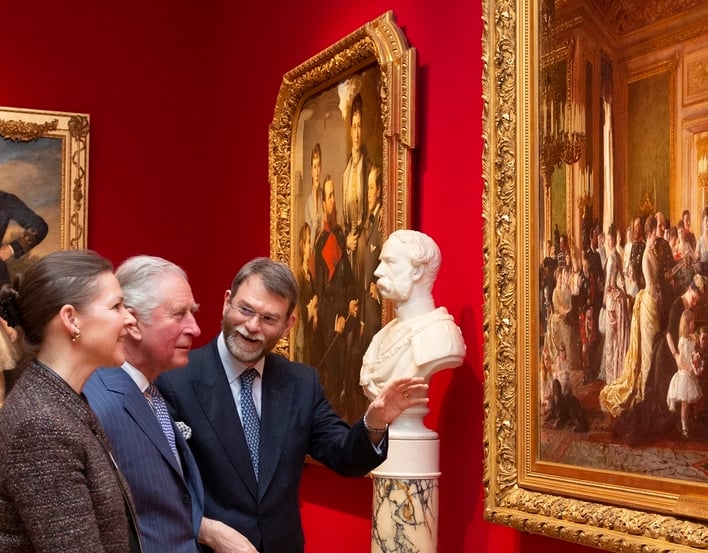 HM King Charles III visiting the exhibition 'Russia, Royalty & the Romanovs' with curators Caroline de Guitaut and Stephen Patterson