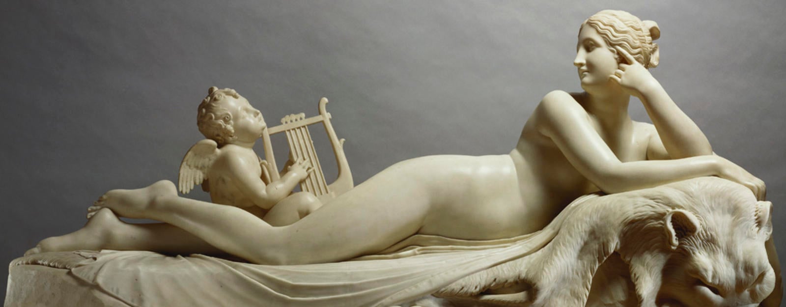 Nymph reclining with a nymph playing a lyre