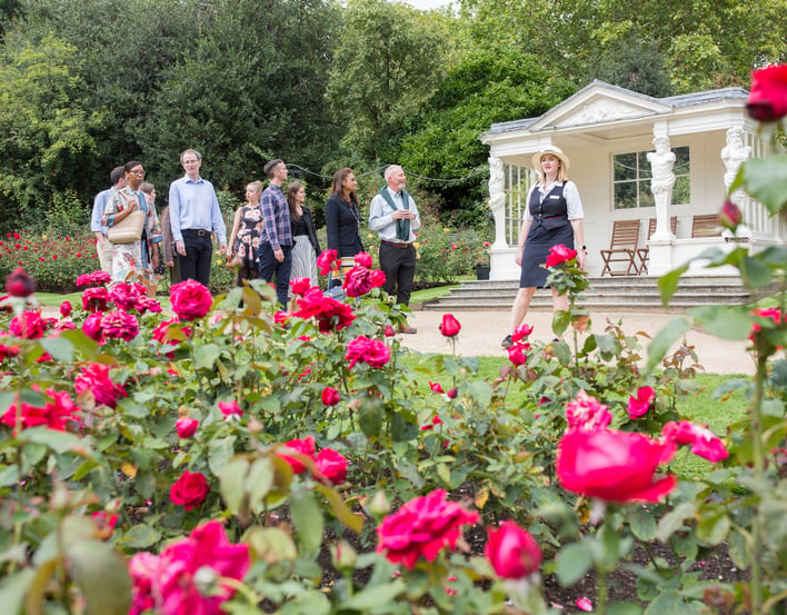 Visitors on a tour of the garden of Buckingham Palace