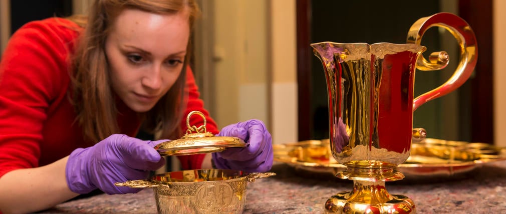 Siobhan assists with the installation of an exhibition at The Queen's Gallery, Buckingham Palace.