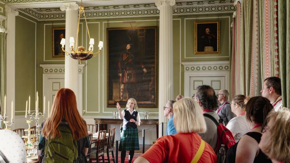 A group of visitors at the Palace of Holyroodhouse
