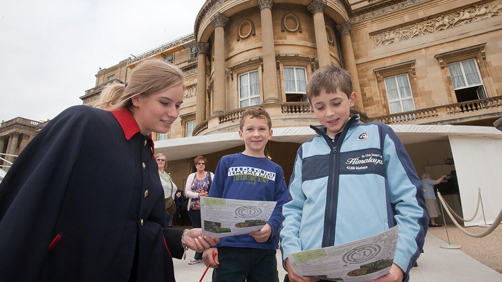 Children with a warden at Buckingham Palace