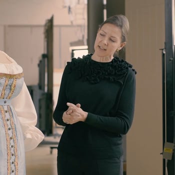 Conservators work on the dress and the portrait of Princess Charlotte in which she is wearing it