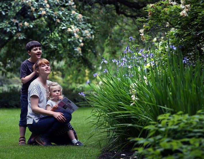 Family in the gardens at the Palace of Holyroodhouse
